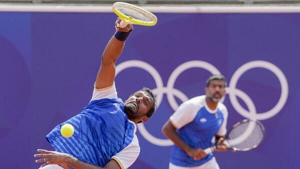 <div class="paragraphs"><p>Indian tennis player Rohan Bopanna and N. Sriram Balaji practise for the Men’s Doubles Tennis event ahead of the Paris 2024 Olympics, at the Roland Garros Stadium in Paris, Wednesday, July 24, 2024.</p></div>